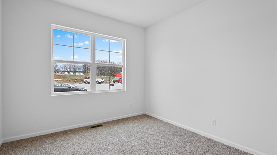 17523 West Windemere Circle Lockport, IL 60441 - Photo 10 of 29 an empty room with windows