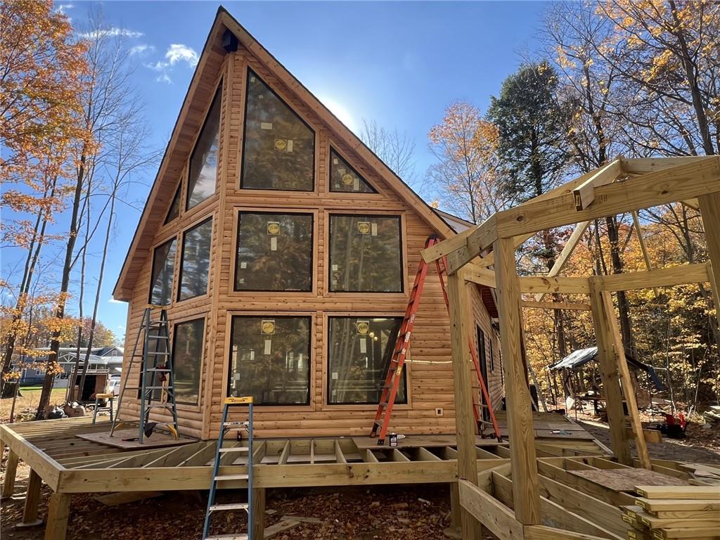 8498 East Lake Road Erie, PA 16511 - Photo 1 of 16 a front view of a house with a yard