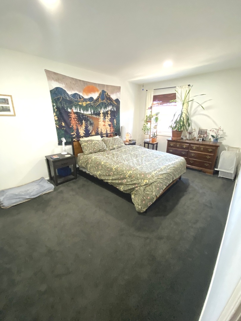 654 Inverrary Lane Deerfield, IL 60015 - Photo 15 of 30 a bedroom with a bed and window