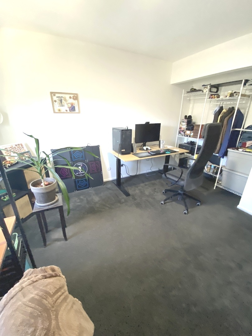 654 Inverrary Lane Deerfield, IL 60015 - Photo 18 of 30 a living room with furniture and a rug
