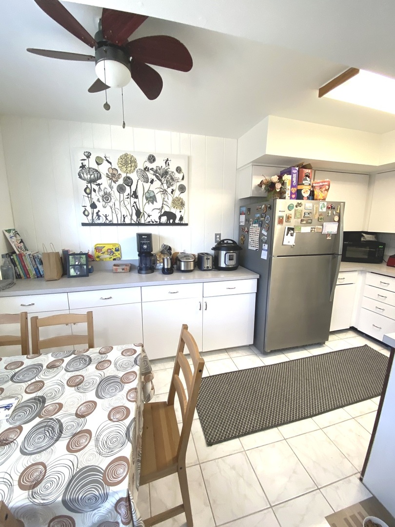 654 Inverrary Lane Deerfield, IL 60015 - Photo 10 of 30 a view of a dining room with furniture and wooden floor