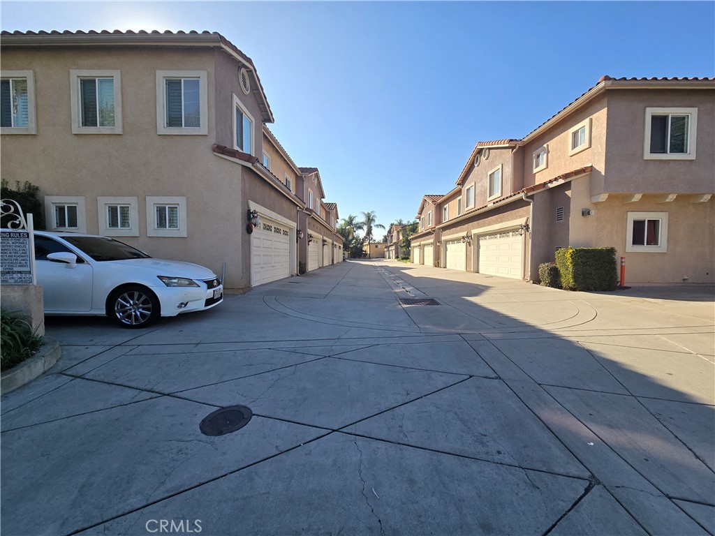 8026 Telegraph Road Downey, CA 90240 - Photo 26 of 26 a car parked in front of a house