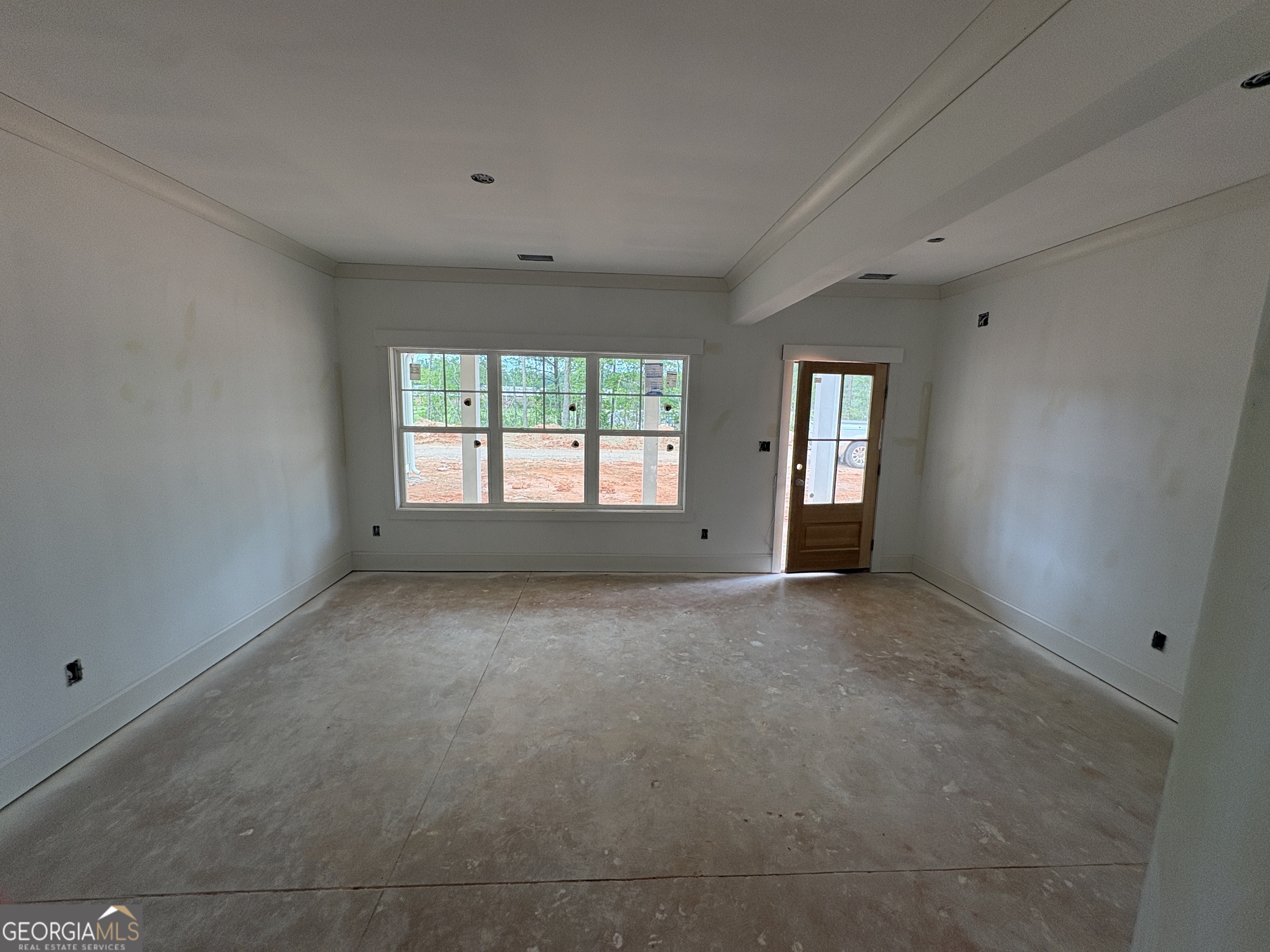1903 Hoods Mill Road Jefferson, GA 30549 - Photo 4 of 6 a view of an empty room with a window