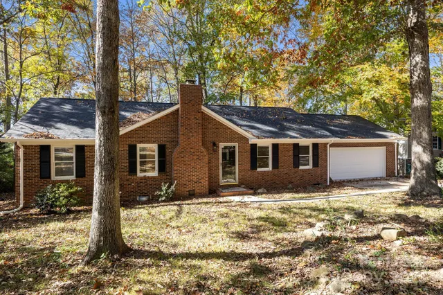 a house with trees in front of it
