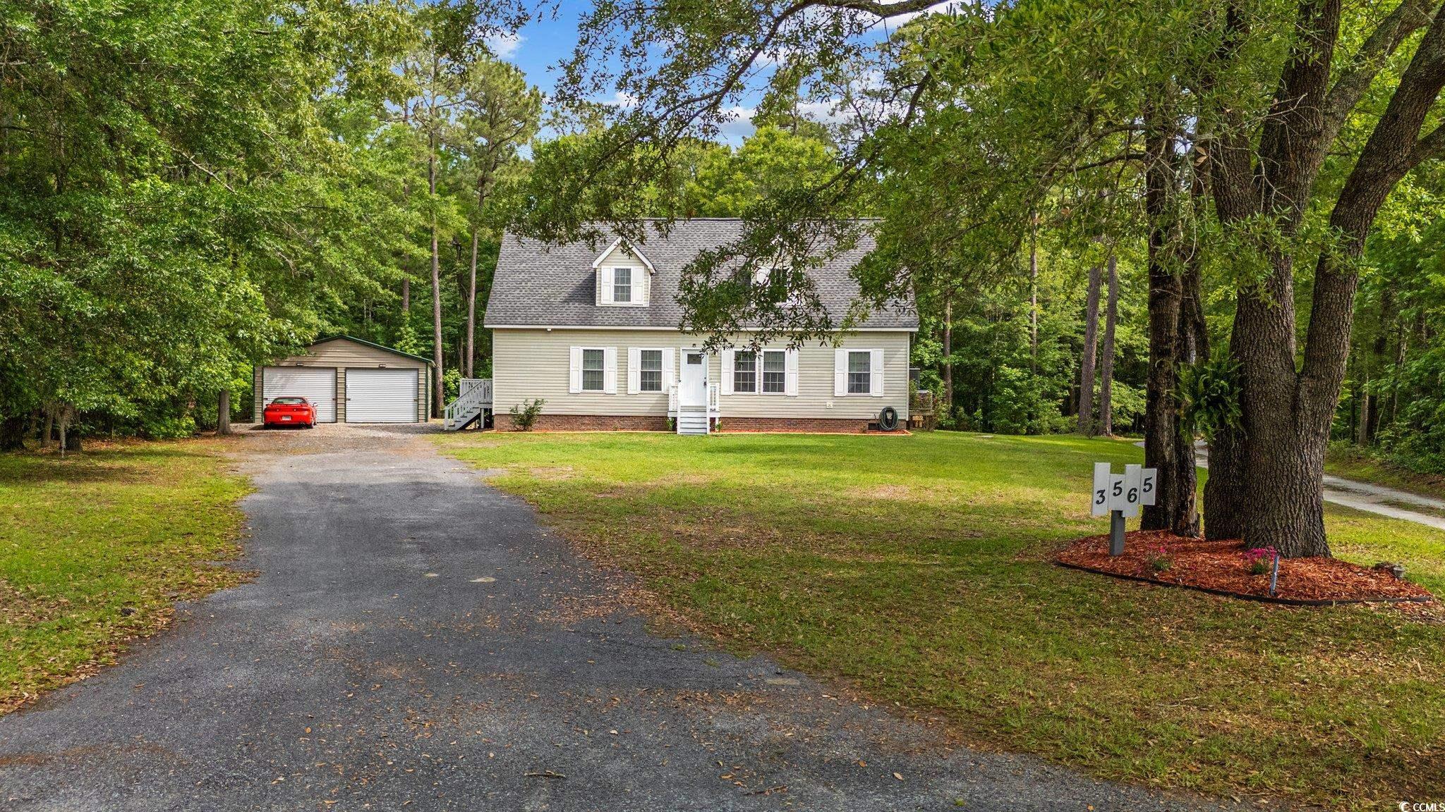 3565 Steamer Trace Road Conway, SC 29527 - Photo 1 of 40 Cape cod-style house featuring an outdoor structur