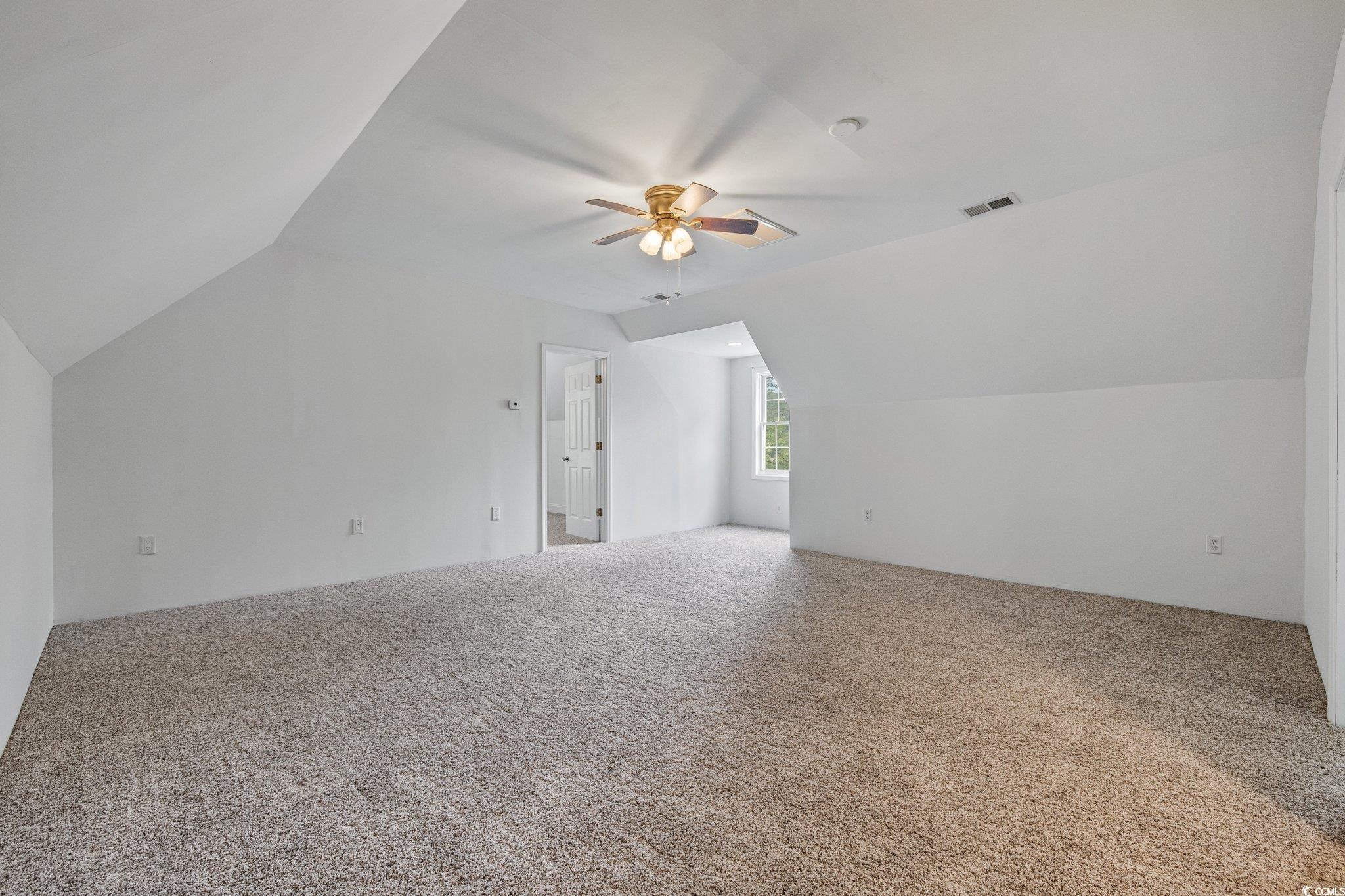 3565 Steamer Trace Road Conway, SC 29527 - Photo 23 of 40 Bonus room featuring vaulted ceiling, a ceiling fa