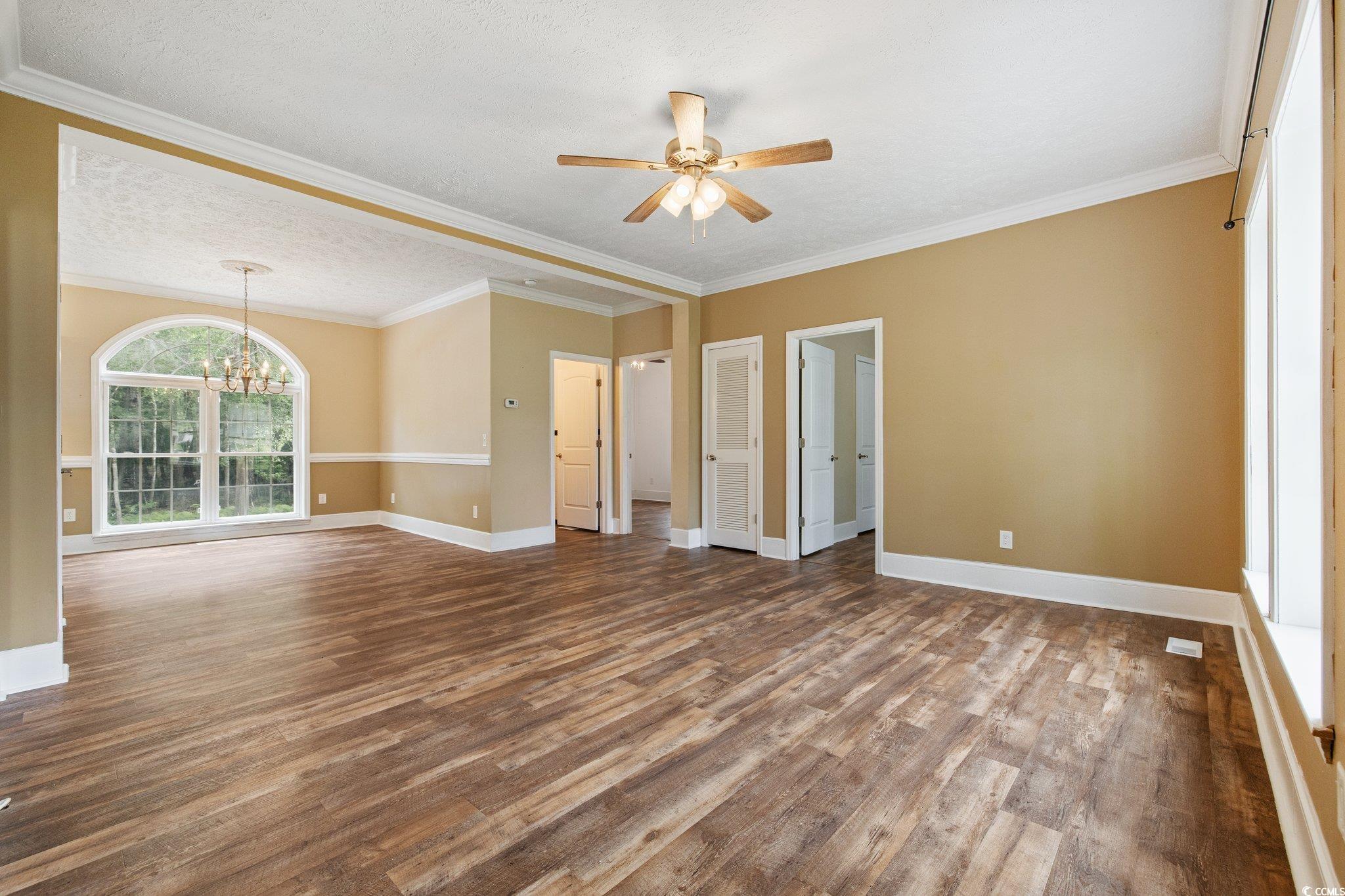 3565 Steamer Trace Road Conway, SC 29527 - Photo 4 of 40 Spare room featuring dark wood-style floors, a cha
