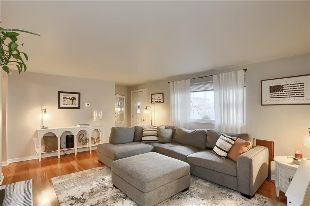 217 Lenore Drive McKees Rocks, PA 15136 - Photo 3 of 18 a living room with furniture and a couch