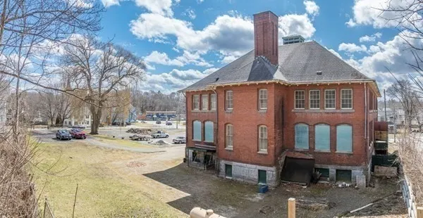 a sign on the side of a building