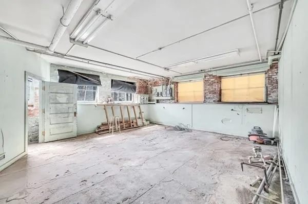 a view of a livingroom with a window