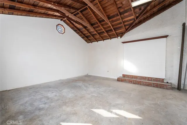 a view of a room with racks on the wall