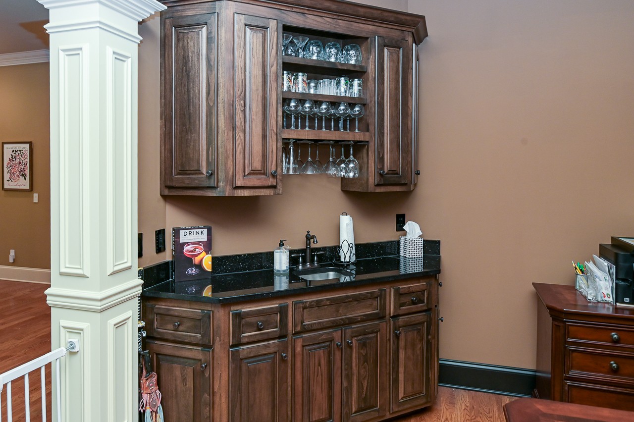 205 Nature Ridge Road Tullahoma, TN 37388 - Photo 11 of 58 a kitchen with granite countertop a cabinets and a stove