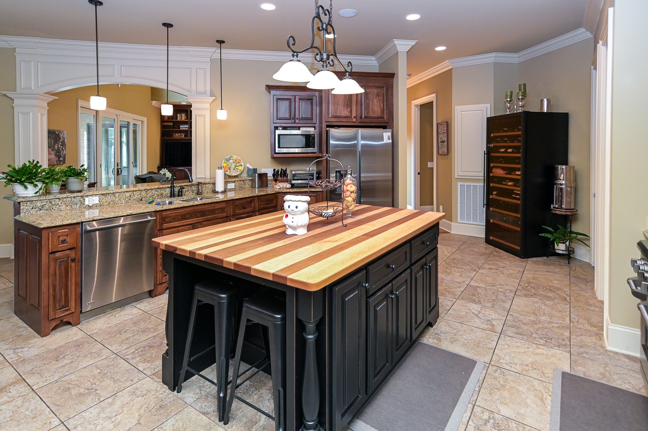 205 Nature Ridge Road Tullahoma, TN 37388 - Photo 20 of 58 a kitchen with granite countertop a sink and a refrigerator