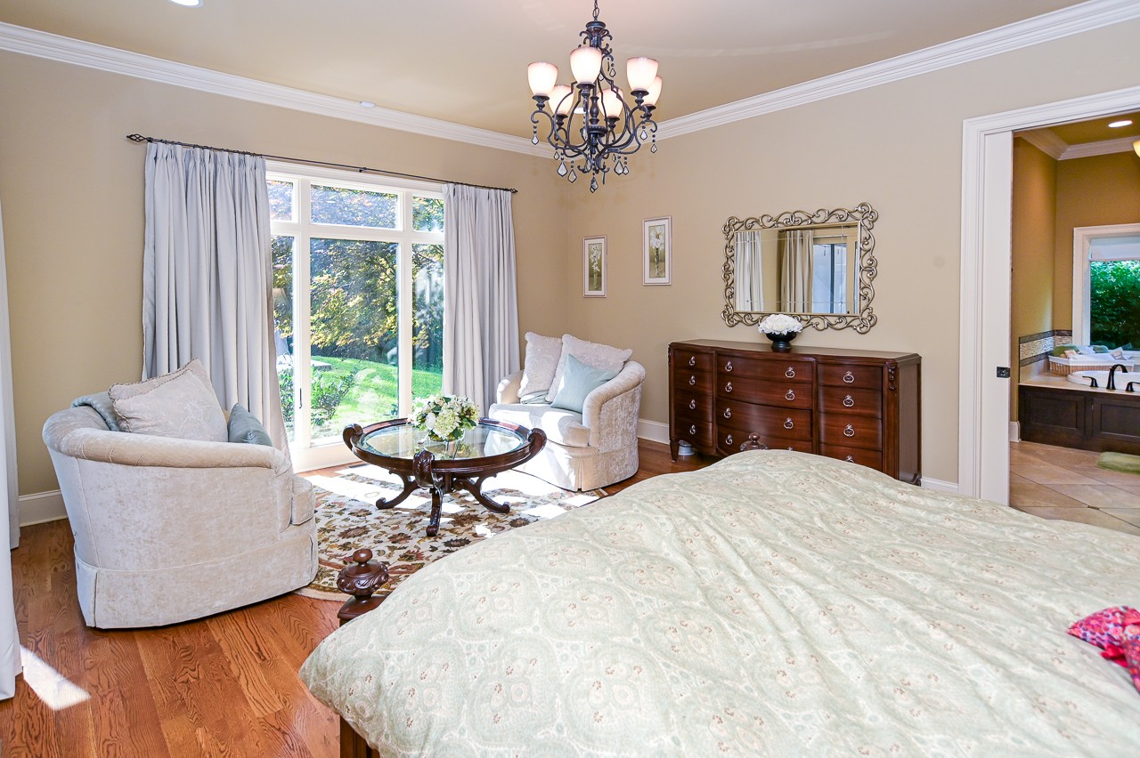 205 Nature Ridge Road Tullahoma, TN 37388 - Photo 26 of 58 a living room with furniture and a chandelier