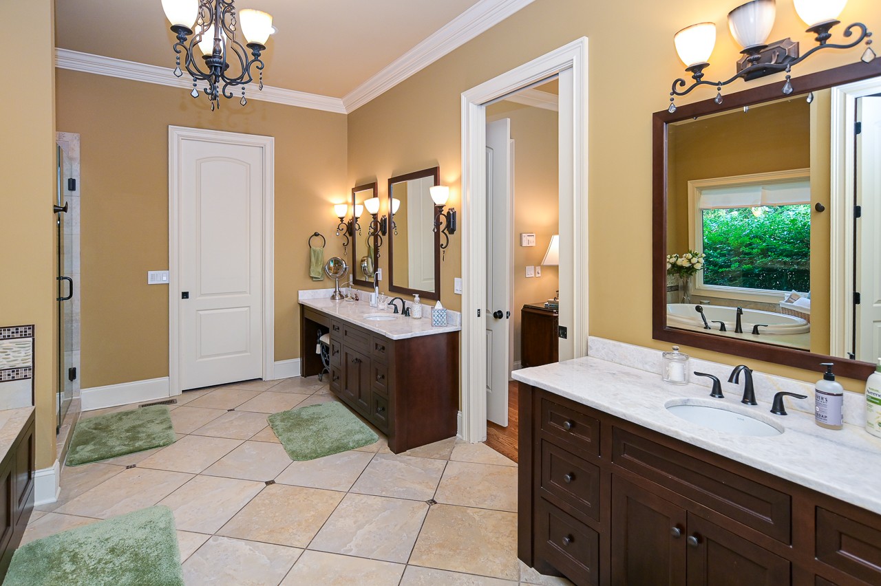205 Nature Ridge Road Tullahoma, TN 37388 - Photo 27 of 58 a spacious bathroom with a sink double vanity and a mirror
