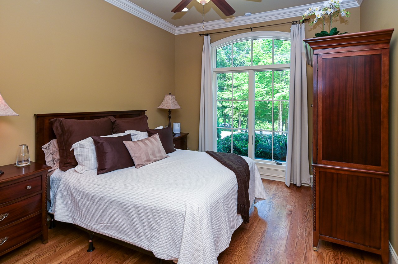 205 Nature Ridge Road Tullahoma, TN 37388 - Photo 30 of 58 a bed sitting in a bedroom next to a window