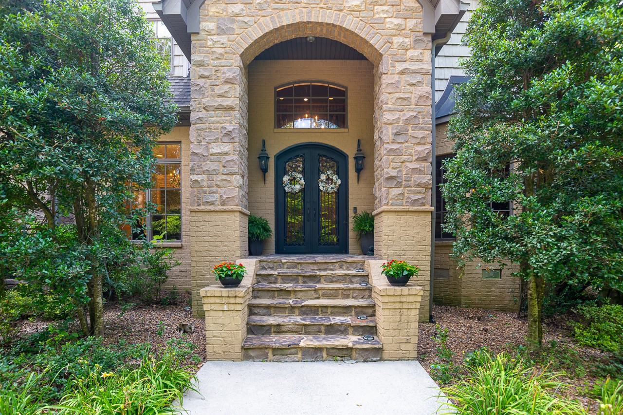 205 Nature Ridge Road Tullahoma, TN 37388 - Photo 3 of 58 a front view of a house with potted plants