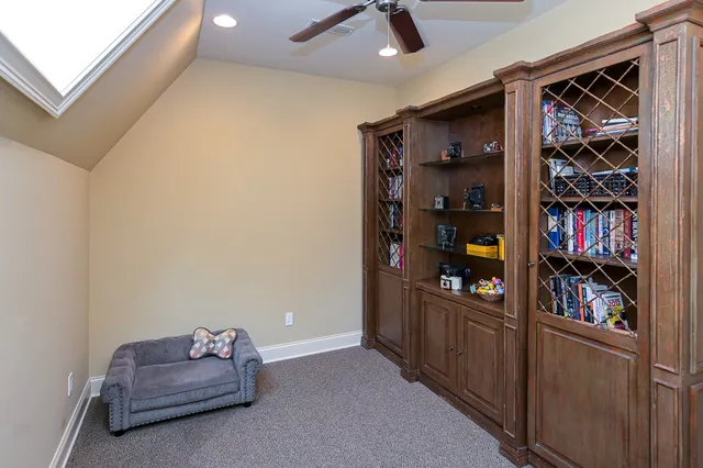 a view of hallway with wooden floor