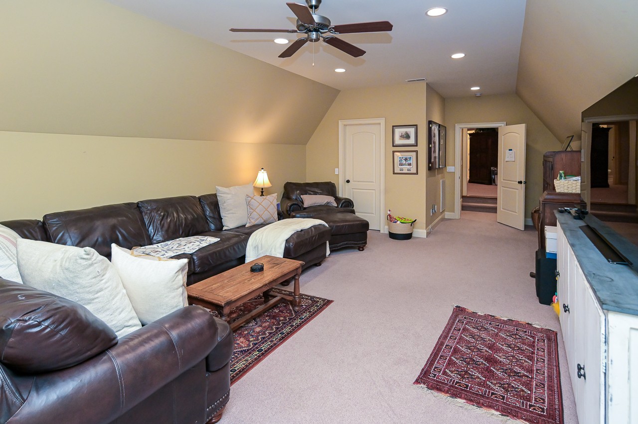 205 Nature Ridge Road Tullahoma, TN 37388 - Photo 42 of 58 a living room with furniture and a flat screen tv