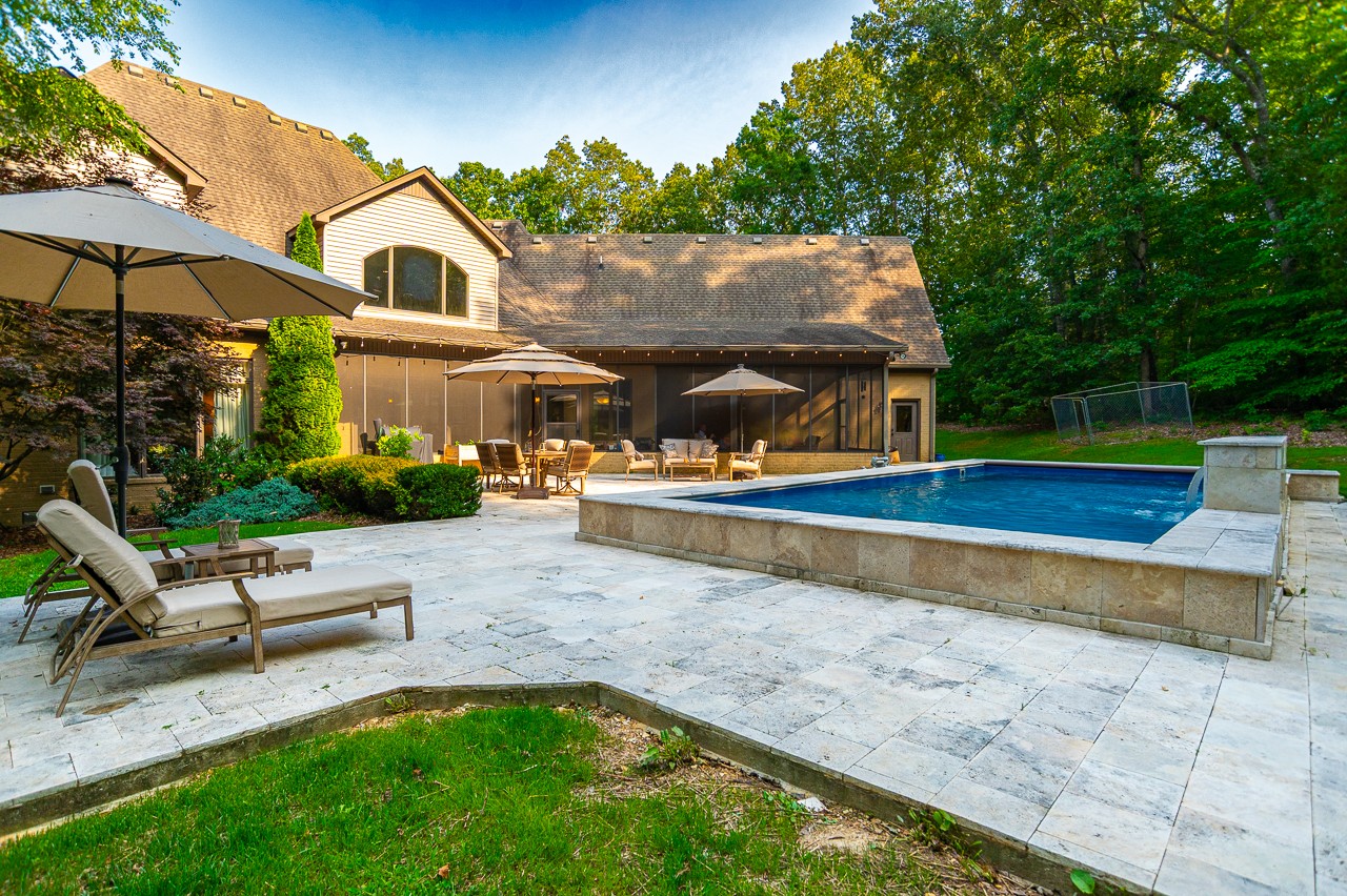 205 Nature Ridge Road Tullahoma, TN 37388 - Photo 48 of 58 swimming pool view with a seating space and a garden view