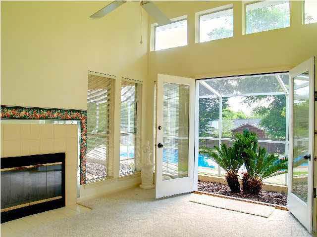 1502 Kings Road Cantonment, FL 32533 - Photo 16 of 24 Double French Doors from Master Bedroom to Lanai
