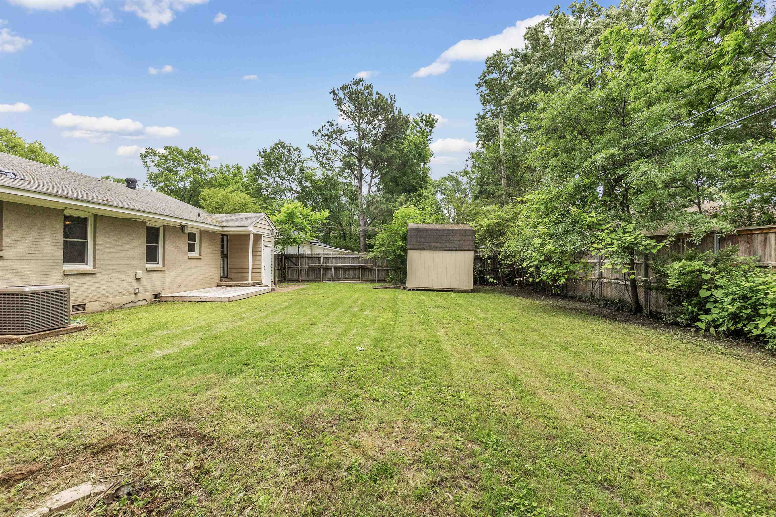 5251 Sequoia Road Memphis, TN 38120 - Photo 4 of 21 a house view with a garden space