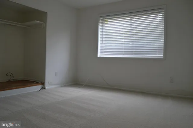 a bathroom with a toilet and a bathtub