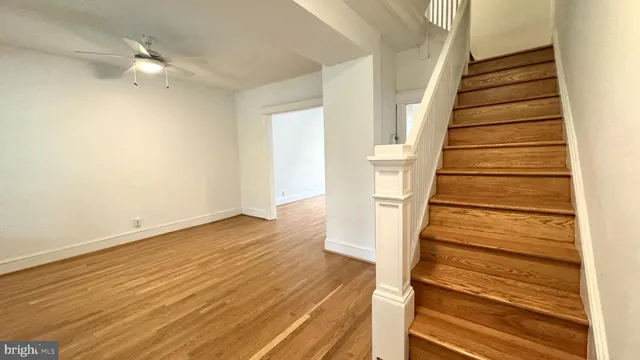 a view of entryway with wooden floor