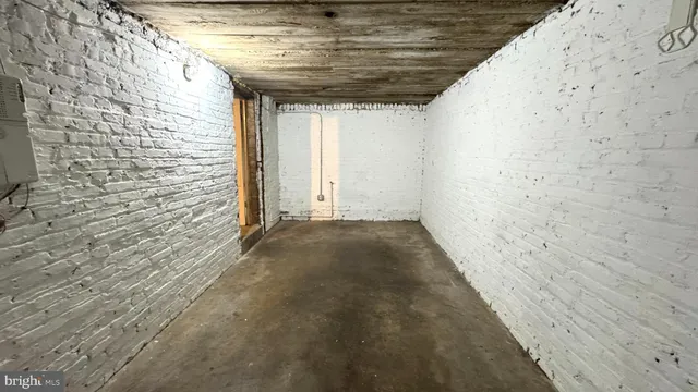 a view of a roof deck with wooden floor and fence
