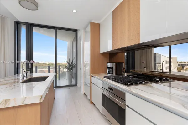a kitchen with large counter top space