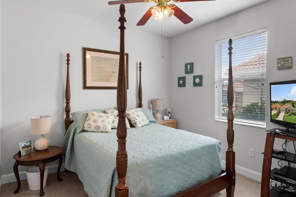 251 West Mickey Mantle Path Hernando, FL 34442 - Photo 30 of 58 a bedroom with a bed and a flat tv screen on the table