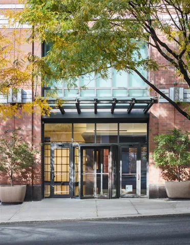 a view of a building and car parked