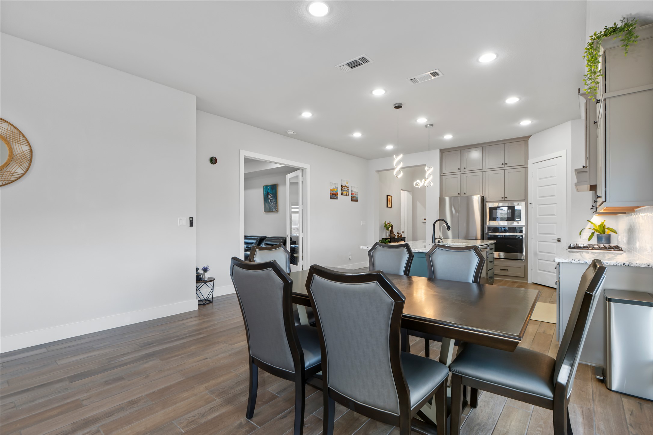 224 Grn Knl Lane Georgetown, TX 78628 - Photo 11 of 38 a view of a dining room with furniture
