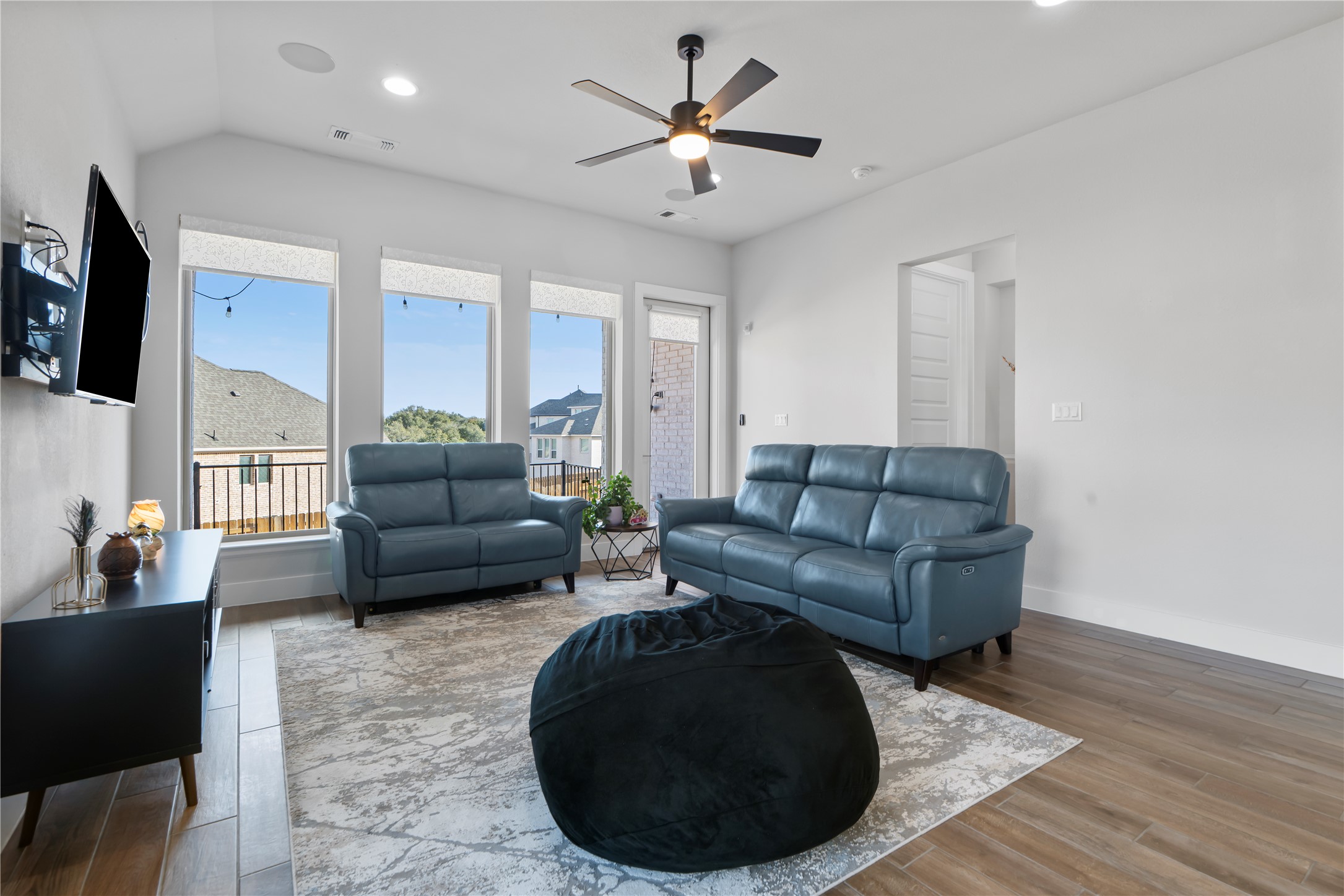 224 Grn Knl Lane Georgetown, TX 78628 - Photo 13 of 38 a living room with furniture and a fireplace