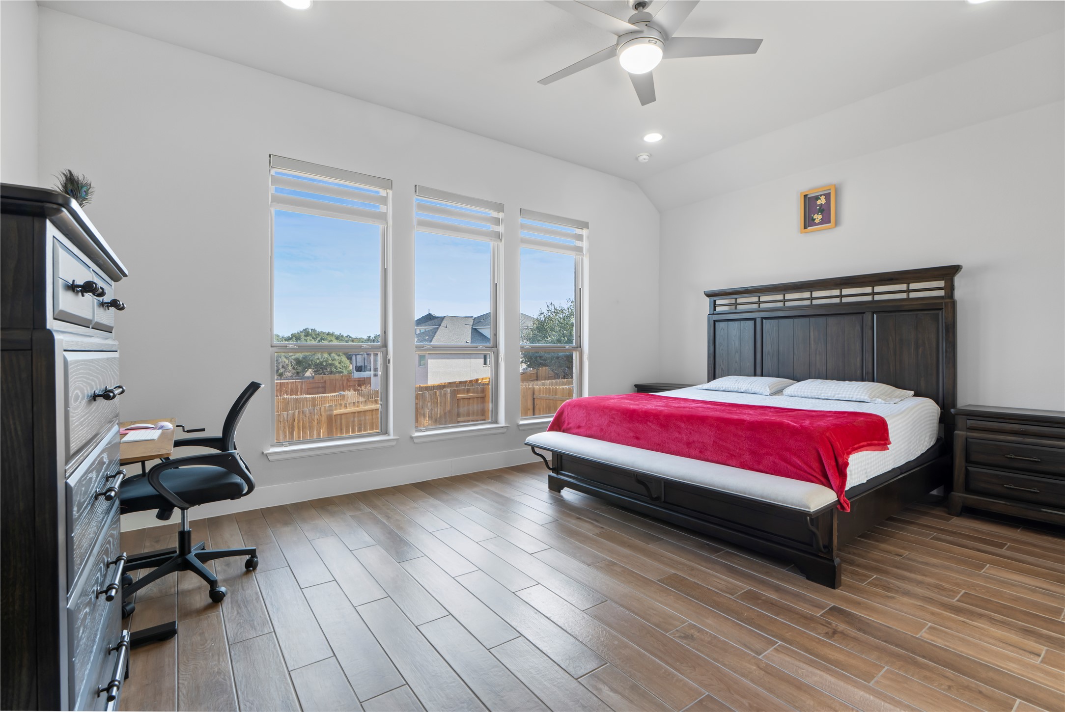 224 Grn Knl Lane Georgetown, TX 78628 - Photo 16 of 38 a spacious bedroom with a bed and a large window