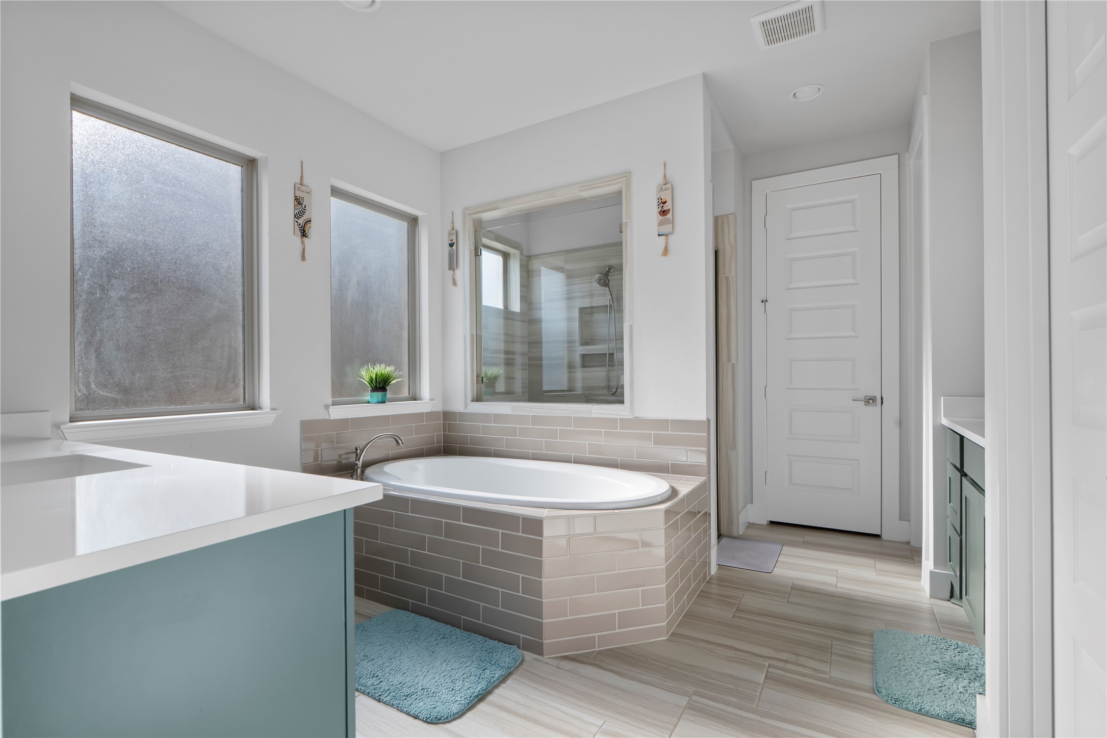 224 Grn Knl Lane Georgetown, TX 78628 - Photo 18 of 38 a spacious bathroom with sink and mirror