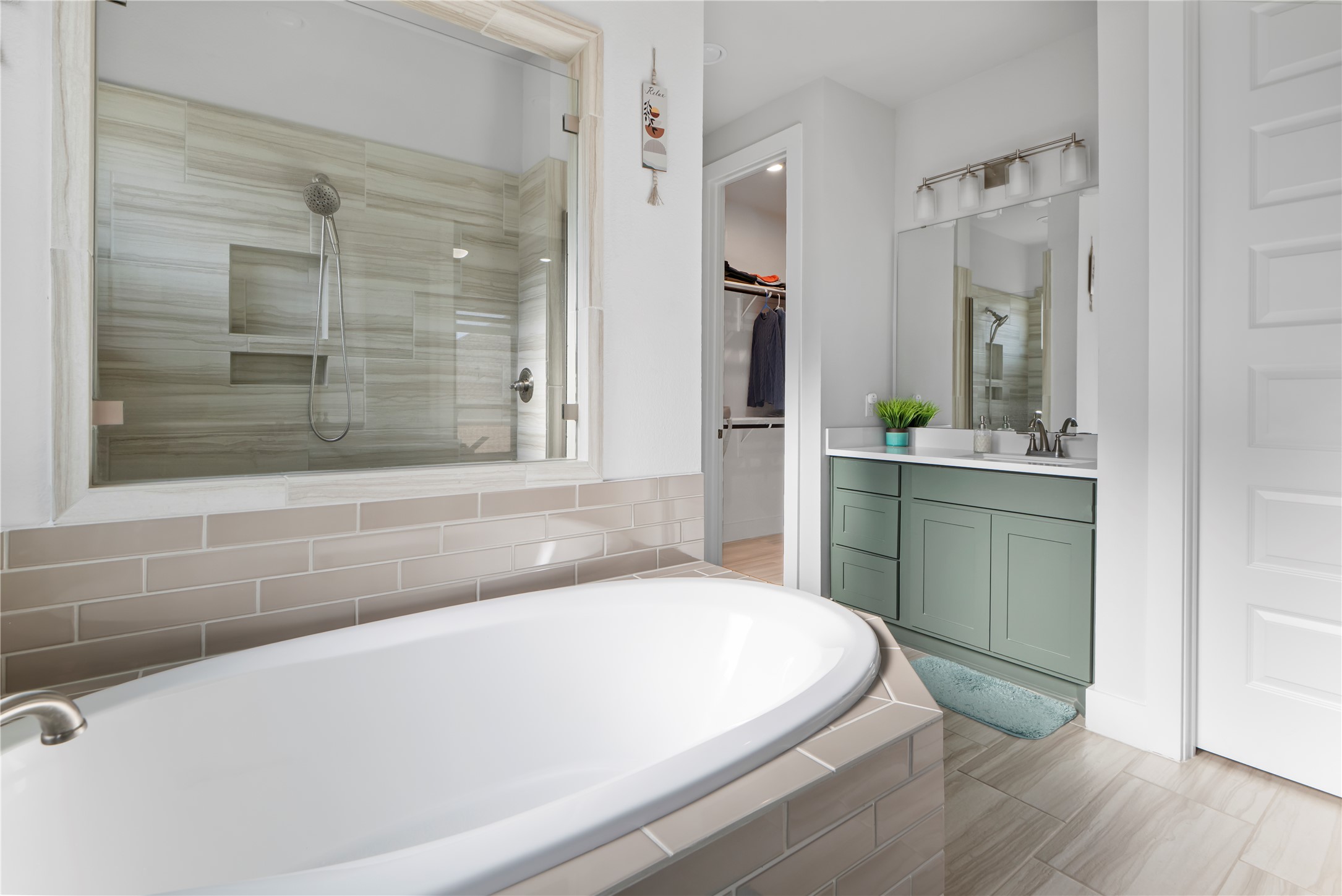 224 Grn Knl Lane Georgetown, TX 78628 - Photo 20 of 38 a bathroom with a sink and a bathtub