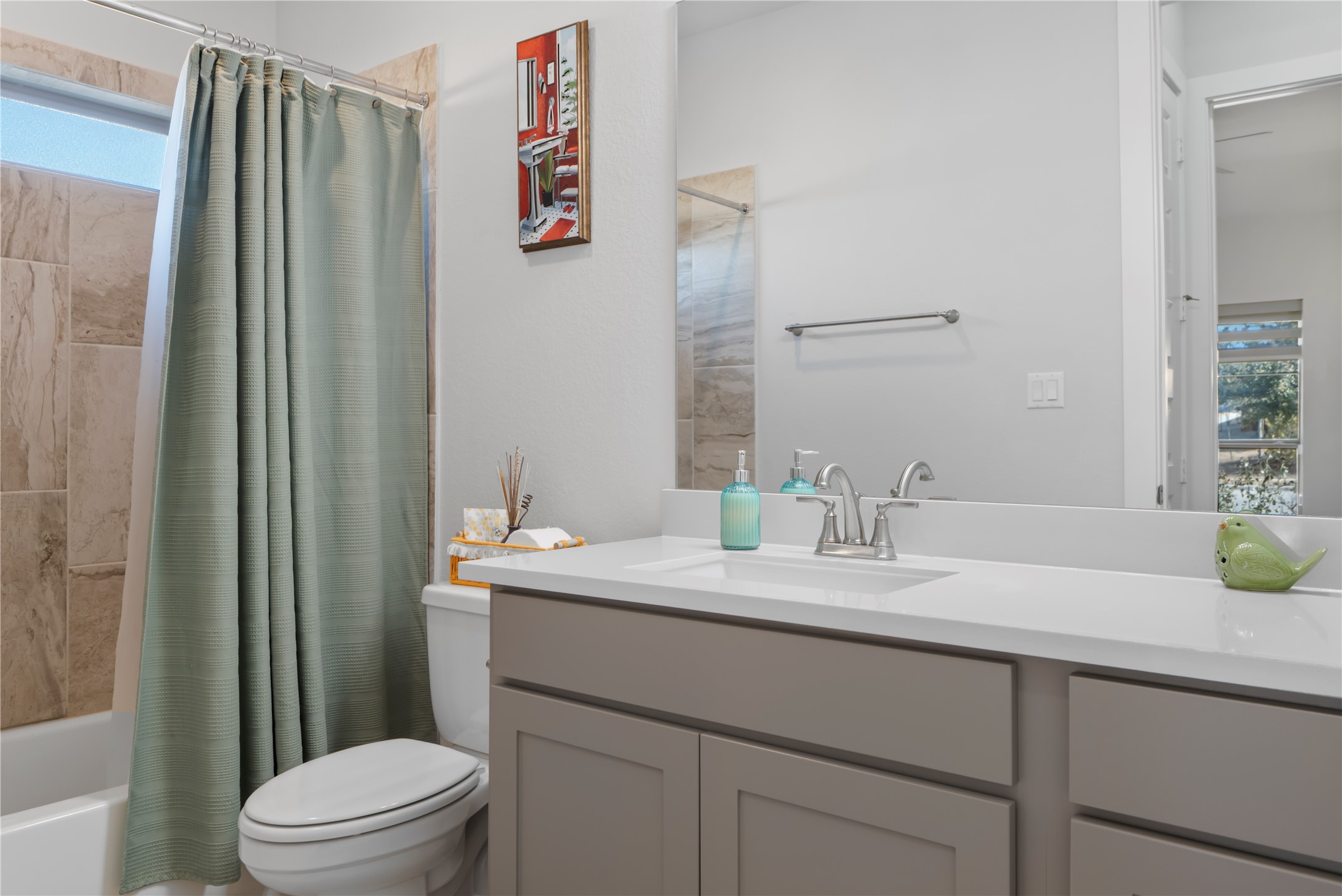 224 Grn Knl Lane Georgetown, TX 78628 - Photo 25 of 38 a bathroom with a granite countertop sink and a mirror