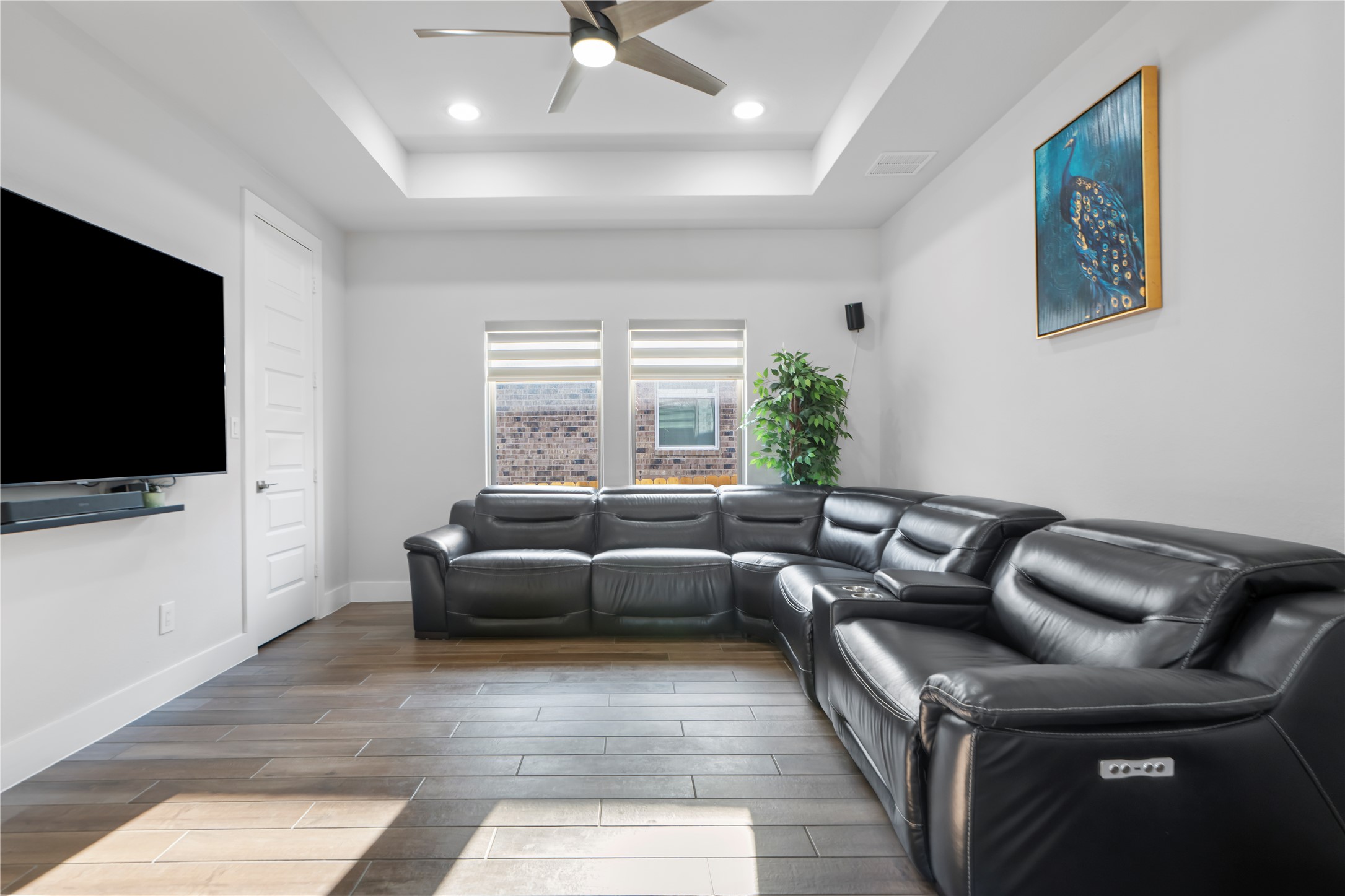 224 Grn Knl Lane Georgetown, TX 78628 - Photo 30 of 38 a living room with furniture and a flat screen tv