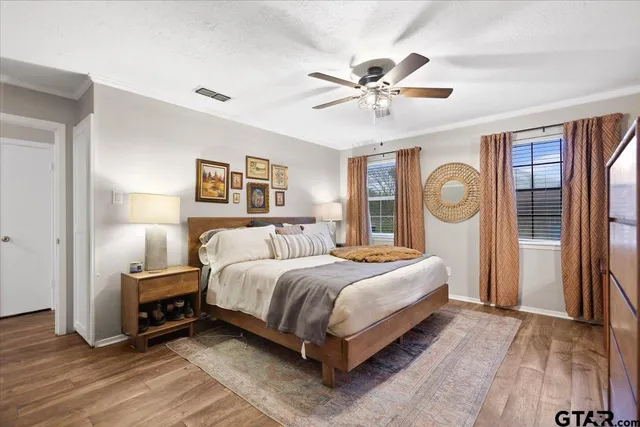 a bed room with a bed and a window