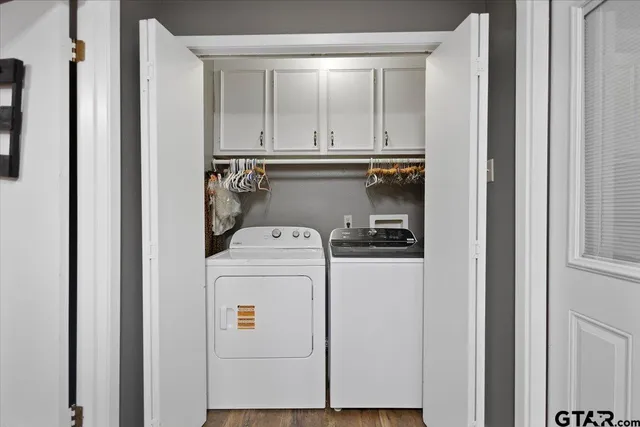 a utility room with dryer and washer