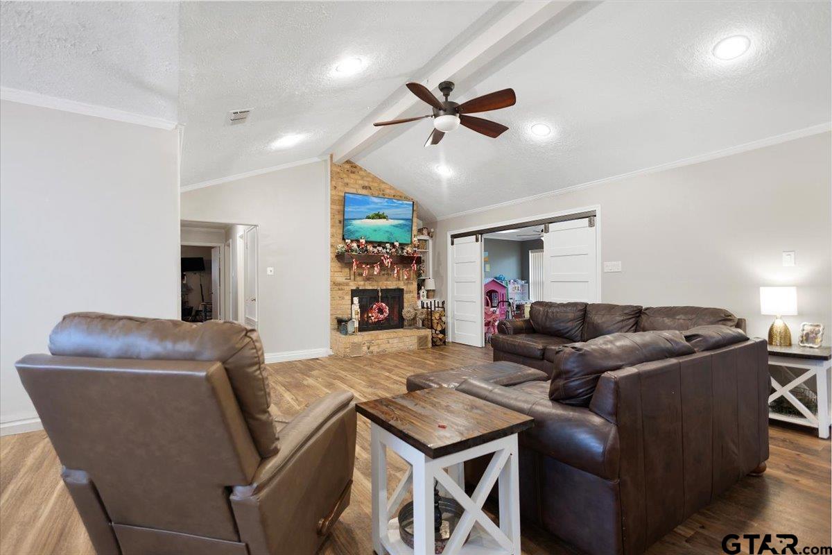 1606 Timothy Street Henderson, TX 75654 - Photo 7 of 33 a living room with furniture and a window