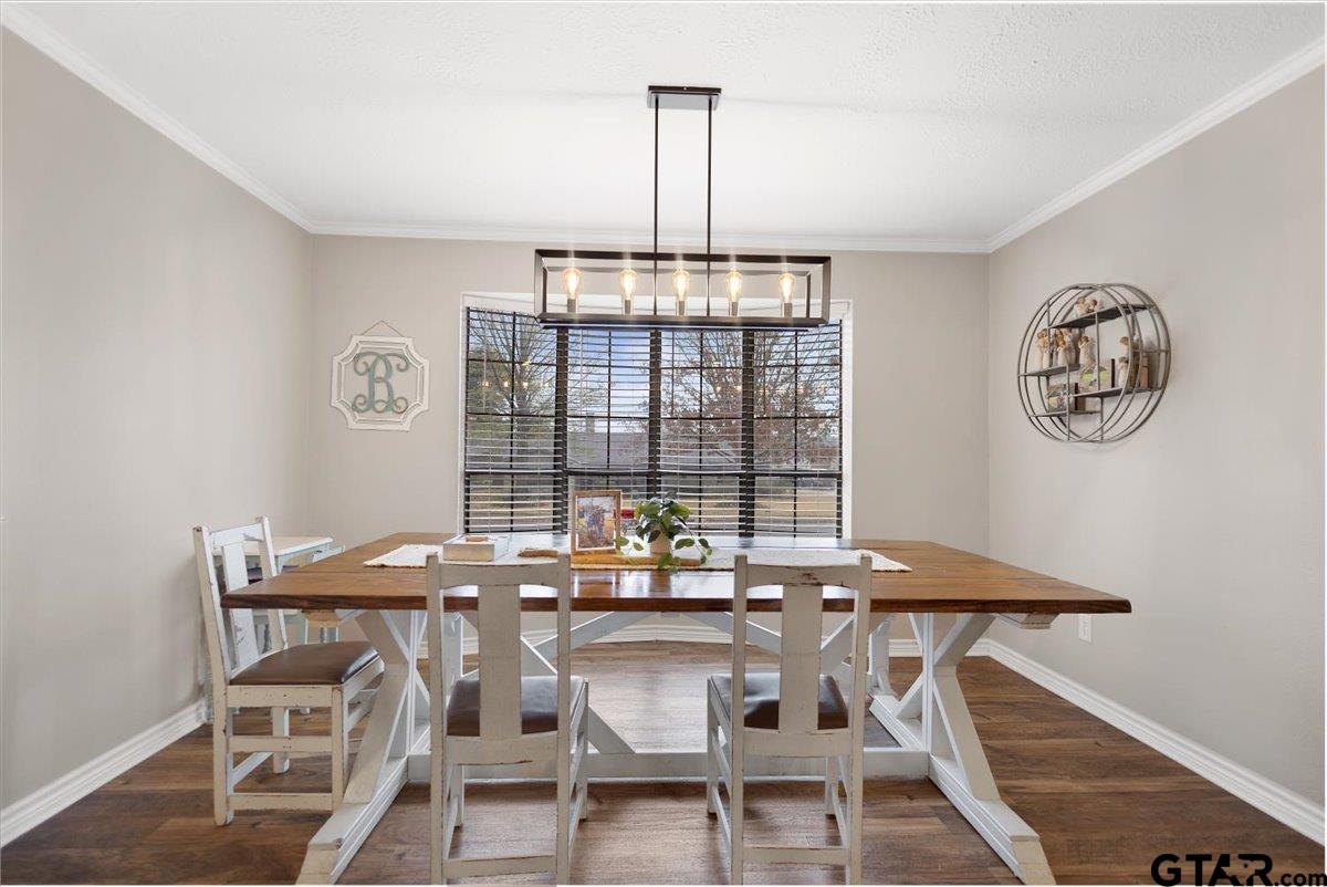 1606 Timothy Street Henderson, TX 75654 - Photo 10 of 33 a view of a dining room with furniture window and outside view