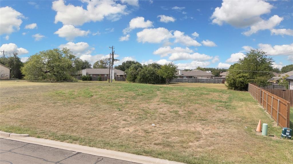 Tbd Tbd Saddle Creek Waco, TX 76708 - Photo 15 of 22 a backyard of a house with table and chairs