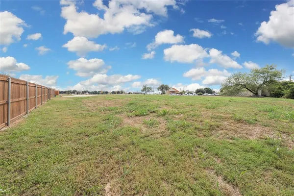 a view of big yard with houses