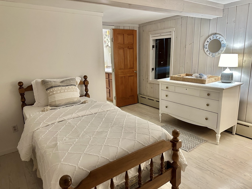 40 Cliff Road South Scituate, MA 02066 - Photo 13 of 30 a bedroom with a bed and a dresser