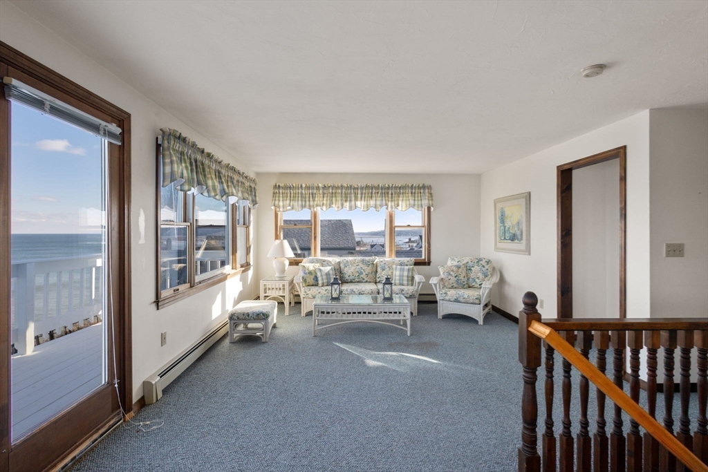 40 Cliff Road South Scituate, MA 02066 - Photo 19 of 30 a living room with furniture and a large window