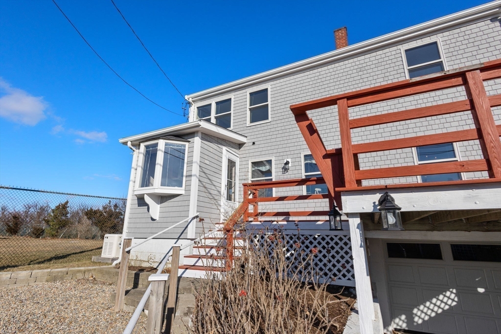 40 Cliff Road South Scituate, MA 02066 - Photo 25 of 30 a front view of a house with a balcony