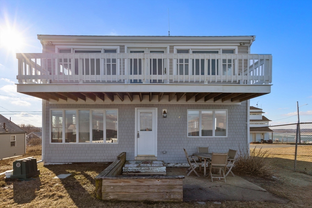 40 Cliff Road South Scituate, MA 02066 - Photo 26 of 30 a front view of a house with many windows