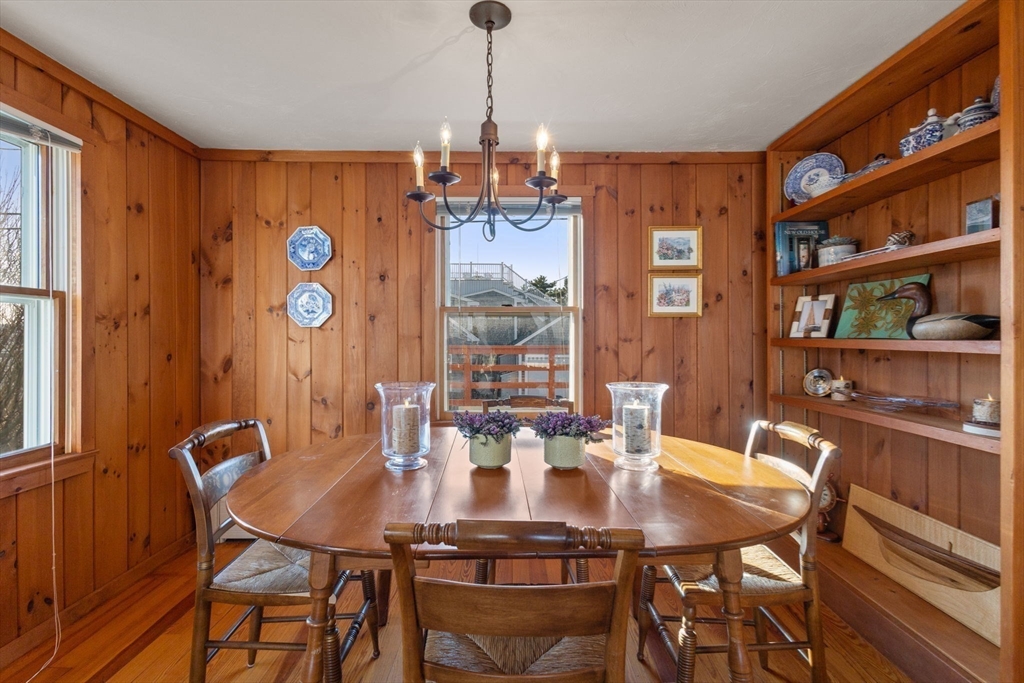 40 Cliff Road South Scituate, MA 02066 - Photo 9 of 30 a view of a dining room with furniture window and wooden floor